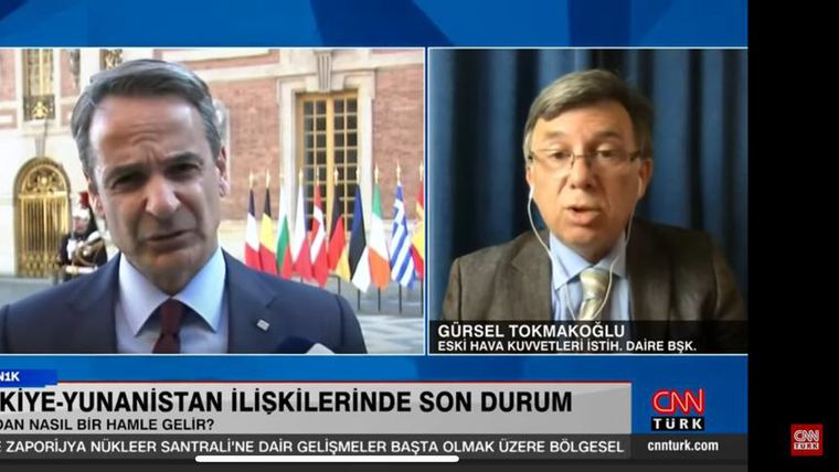 Gürsel Tokmakoğlu on CNN Türk's 5N1K, in a split screen with the Greek prime minister, captioned as former Head of Air Force Intelligence