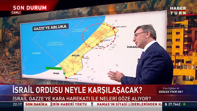 Gürsel Tokmakoğlu at a map of the Gaza blockade on Habertürk