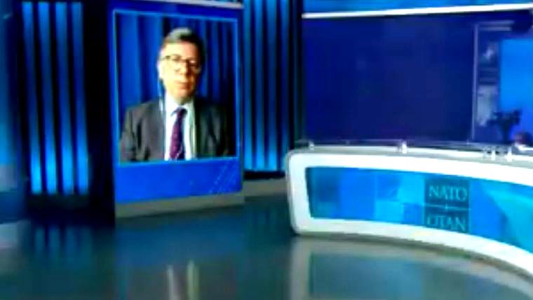 Gürsel Tokmakoğlu joining a NATO discussion on TRT's Arabic channel